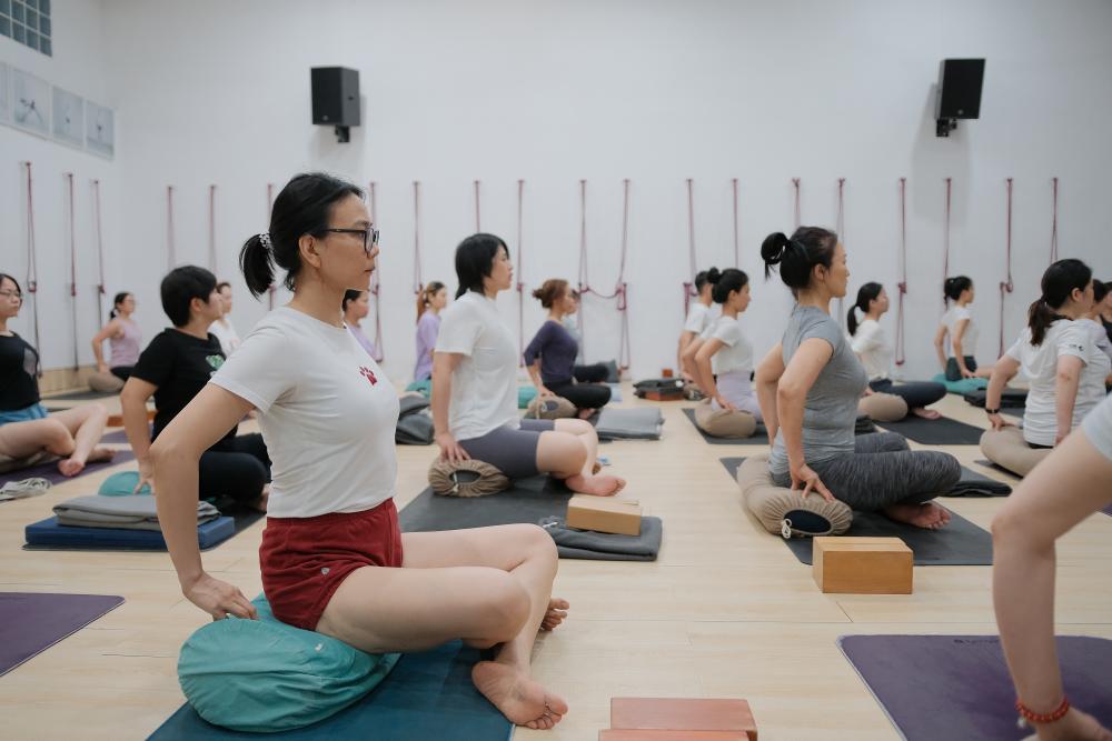 Students attending a yoga class in China as part of their intensive study programme.