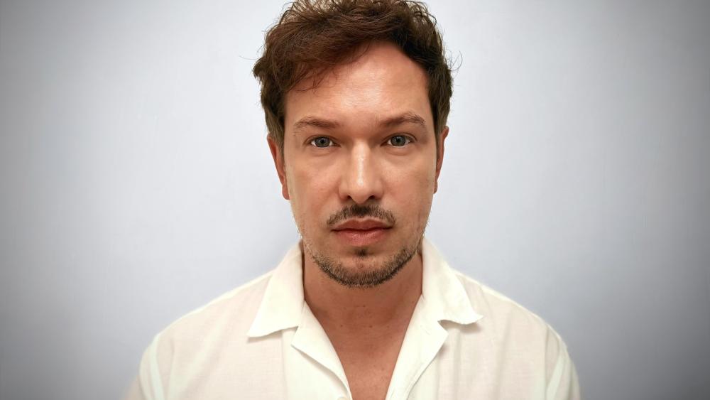 Headshot of Vanja Hamzić.