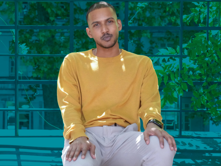 Student sitting on bench