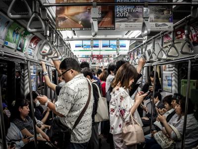People on mobile devices, Shibuya, Japan