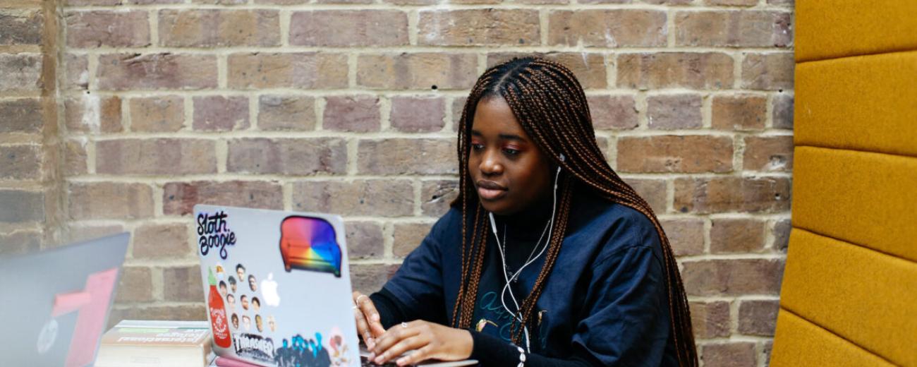 SOAS student working on a laptop