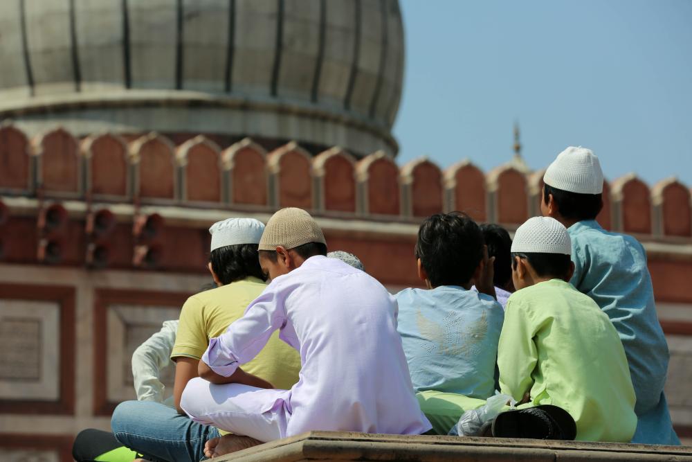 A group of Muslim children in India sitting down