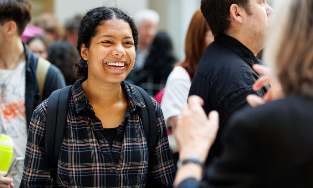 SOAS Student speaking to staff member