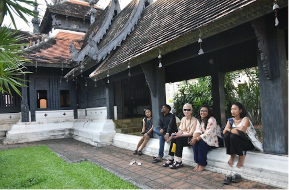 Figure 1. Pre-conference touring of wooden architecture with (l-r) Sulatt Win, Naing Soe, E.Moore, Pwint Phyu Maung and Theint Theint Aung (Photo Kywaswar Oo, Panel 47)