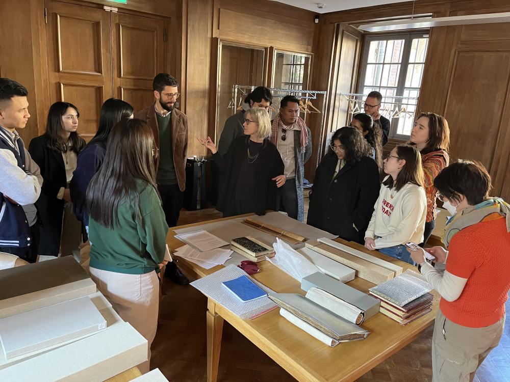 Discussing palm leaf manuscript with librarian Jérôme Petit and Prof Ashley Thompson in the Bibliothèque nationale de France, Paris