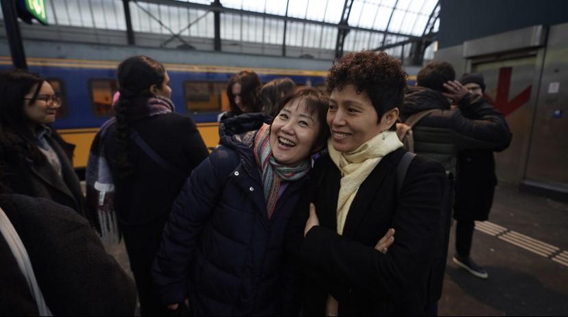 Students at Amsterdam Central Station waiting for the train to Leiden to visit the Volkenkunde museum (courtesy of Sokha Seang)
