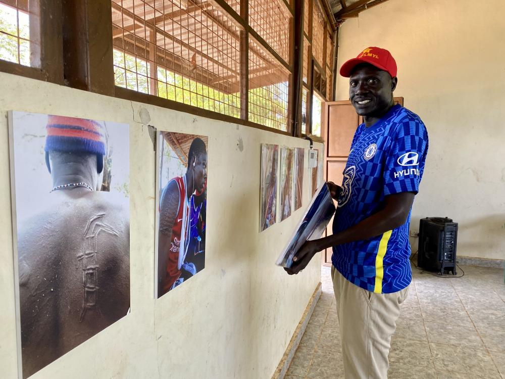 Peter Dacky setting up the exhibit in Pibor town