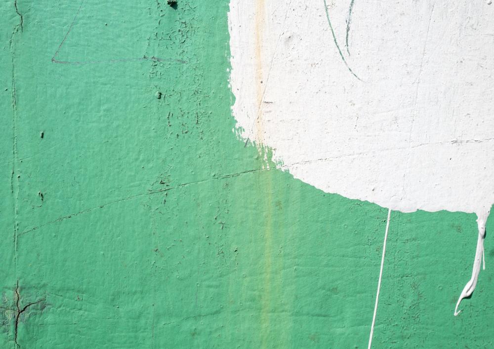 Green paint on a white wall