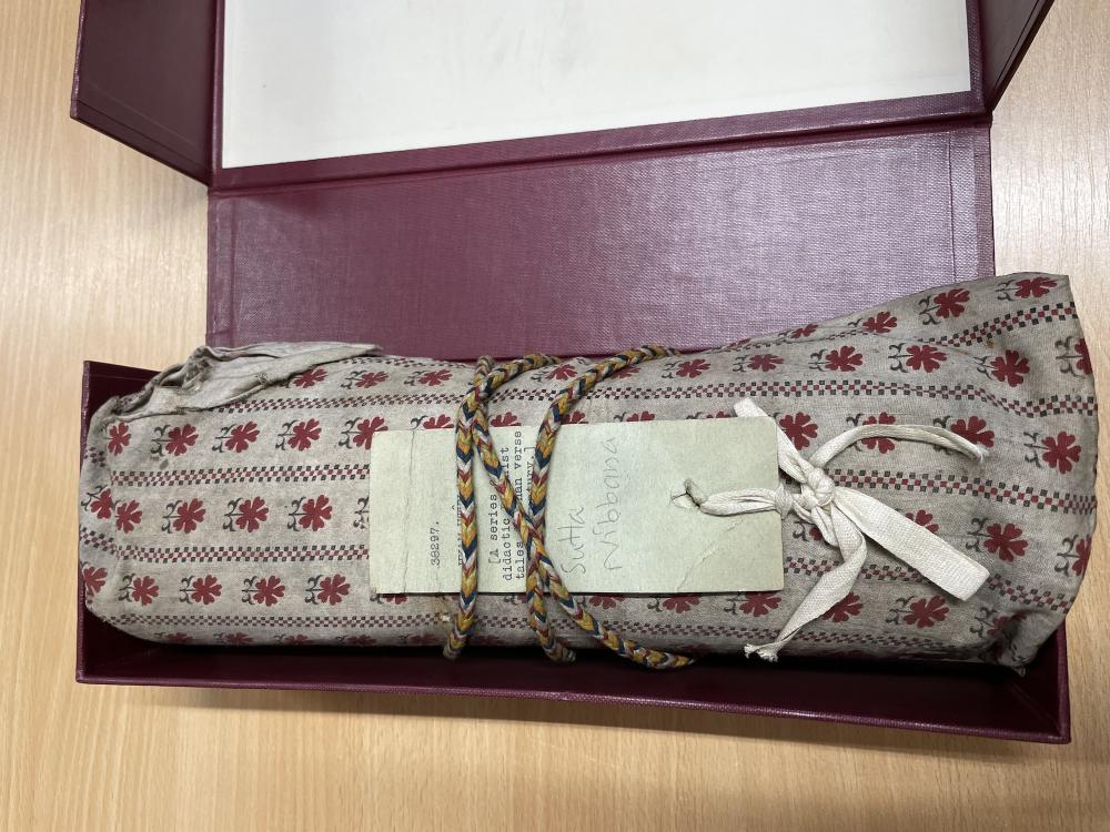 Rolled Manuscript Wrapped with Textile Cloth 