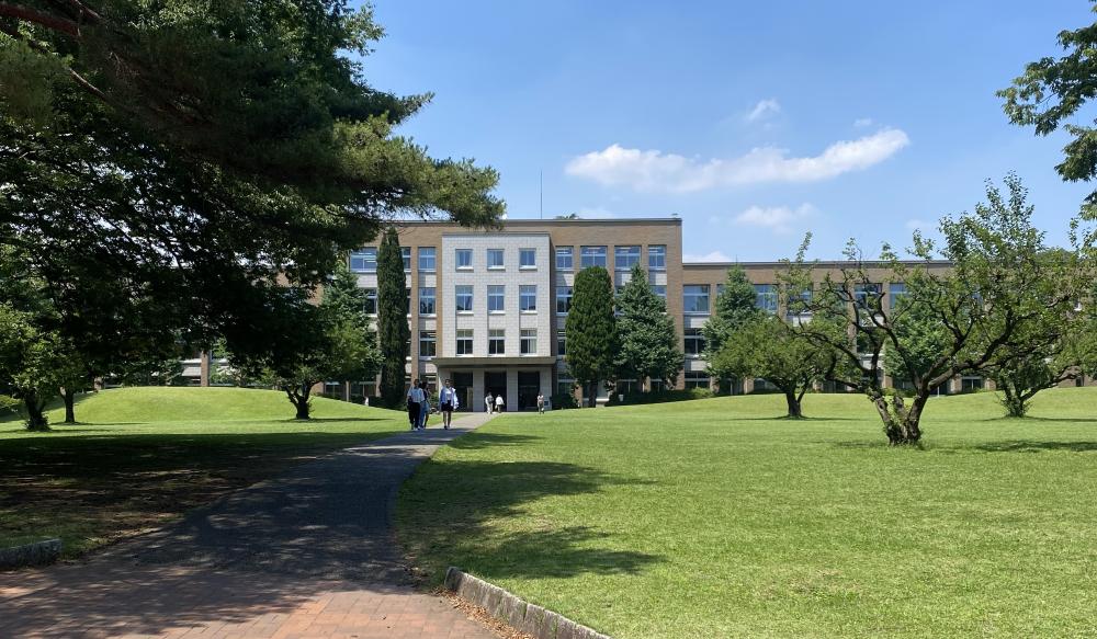 A white university building on a sunny day