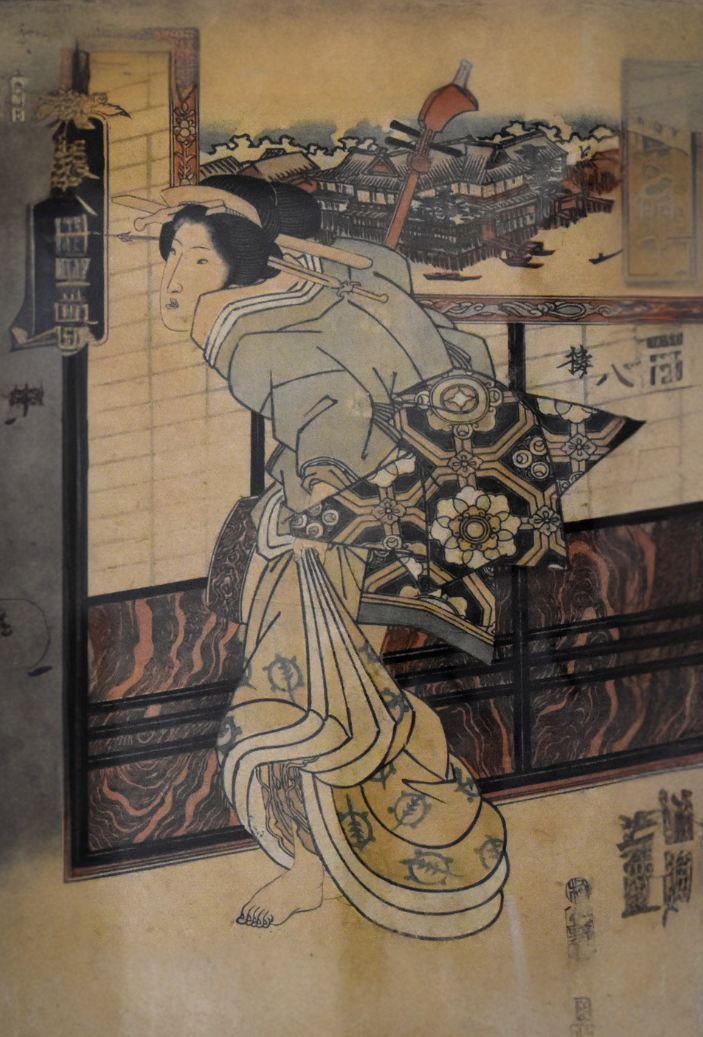 Japanese woodblock showing a woman in a restaurant 