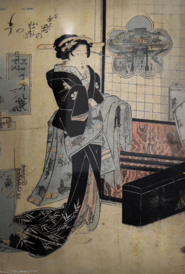 Japanese woodblock showing a courtesan  