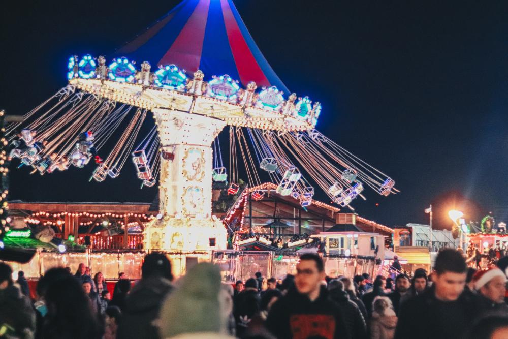 A fairground scene at night