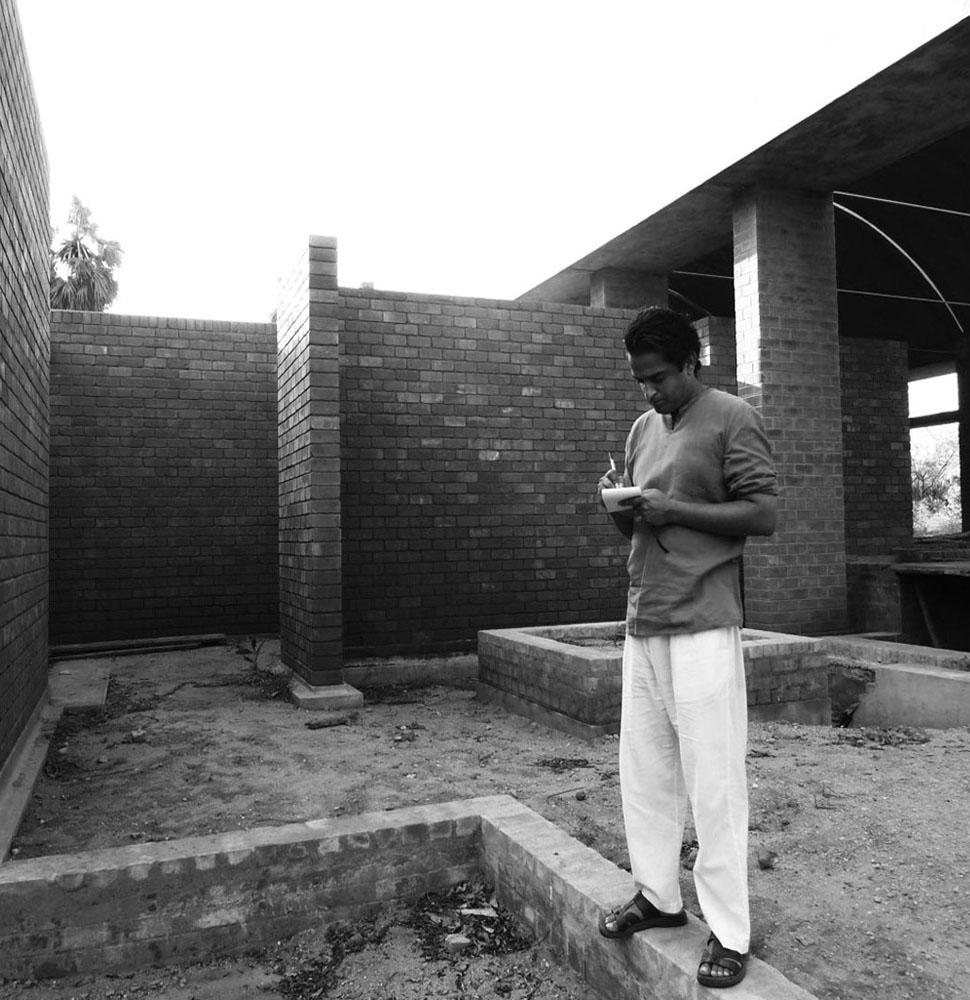 Photo of architect Jateen Lad on a building site