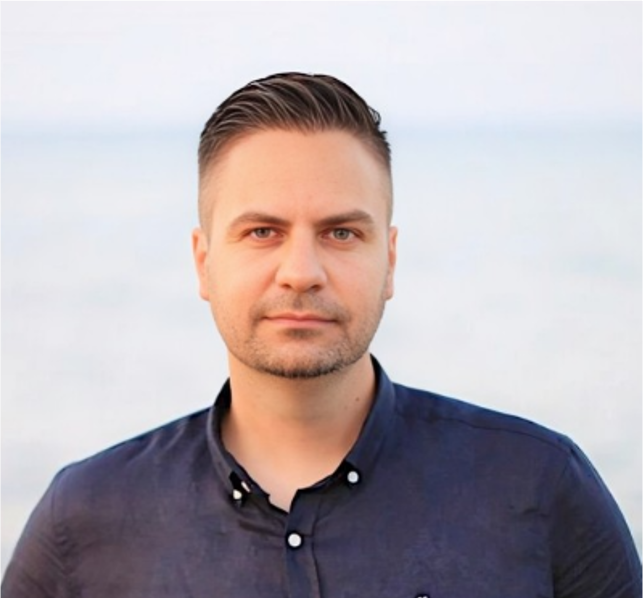 Headshot of Emcet O. Taş