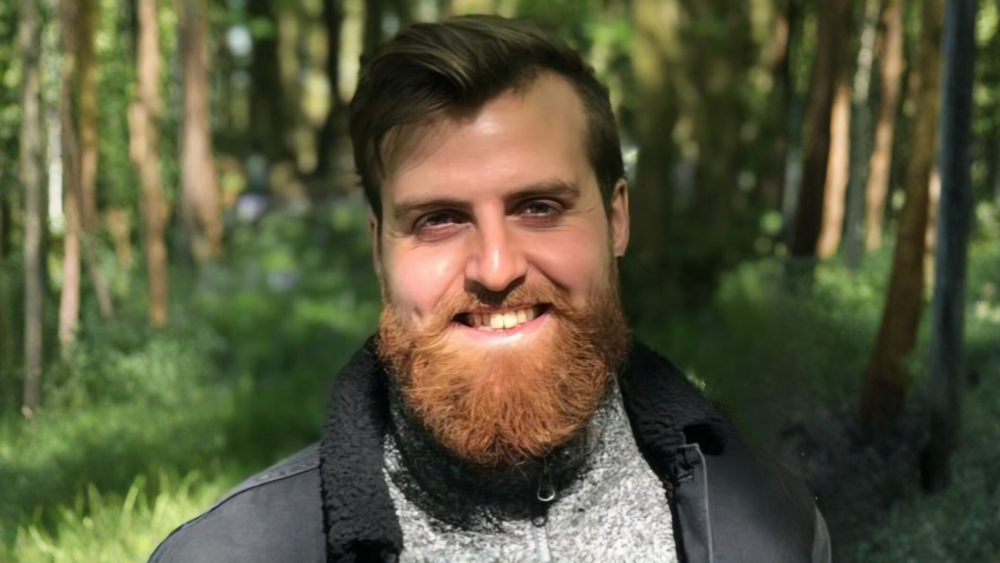 Headshot of James Cooke