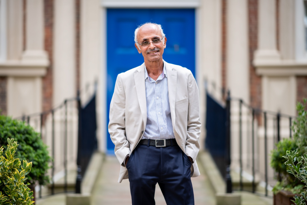 a man standing in front of a door.