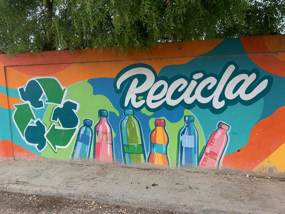 colourful painting on a wall to advertise recycling