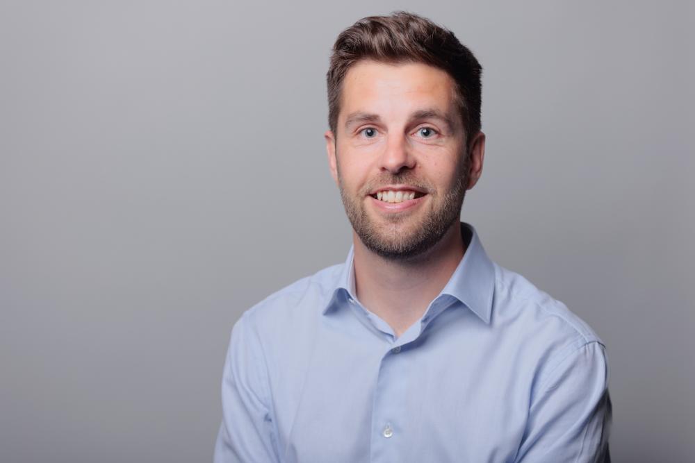 Headshot of Nick Rowland.