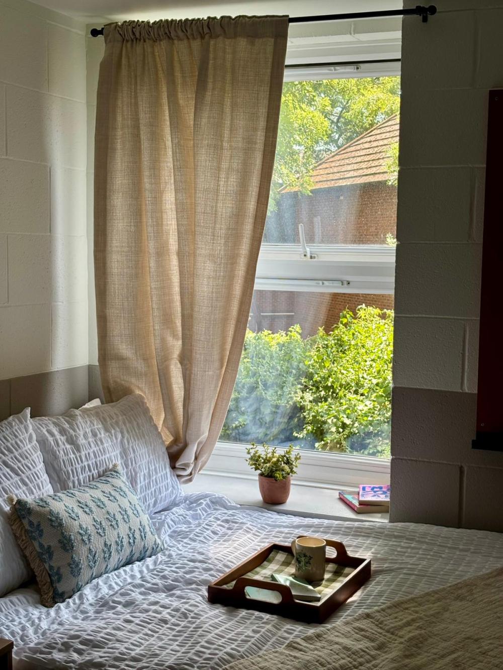 Wood Green accommodation bedroom with window and double bed.