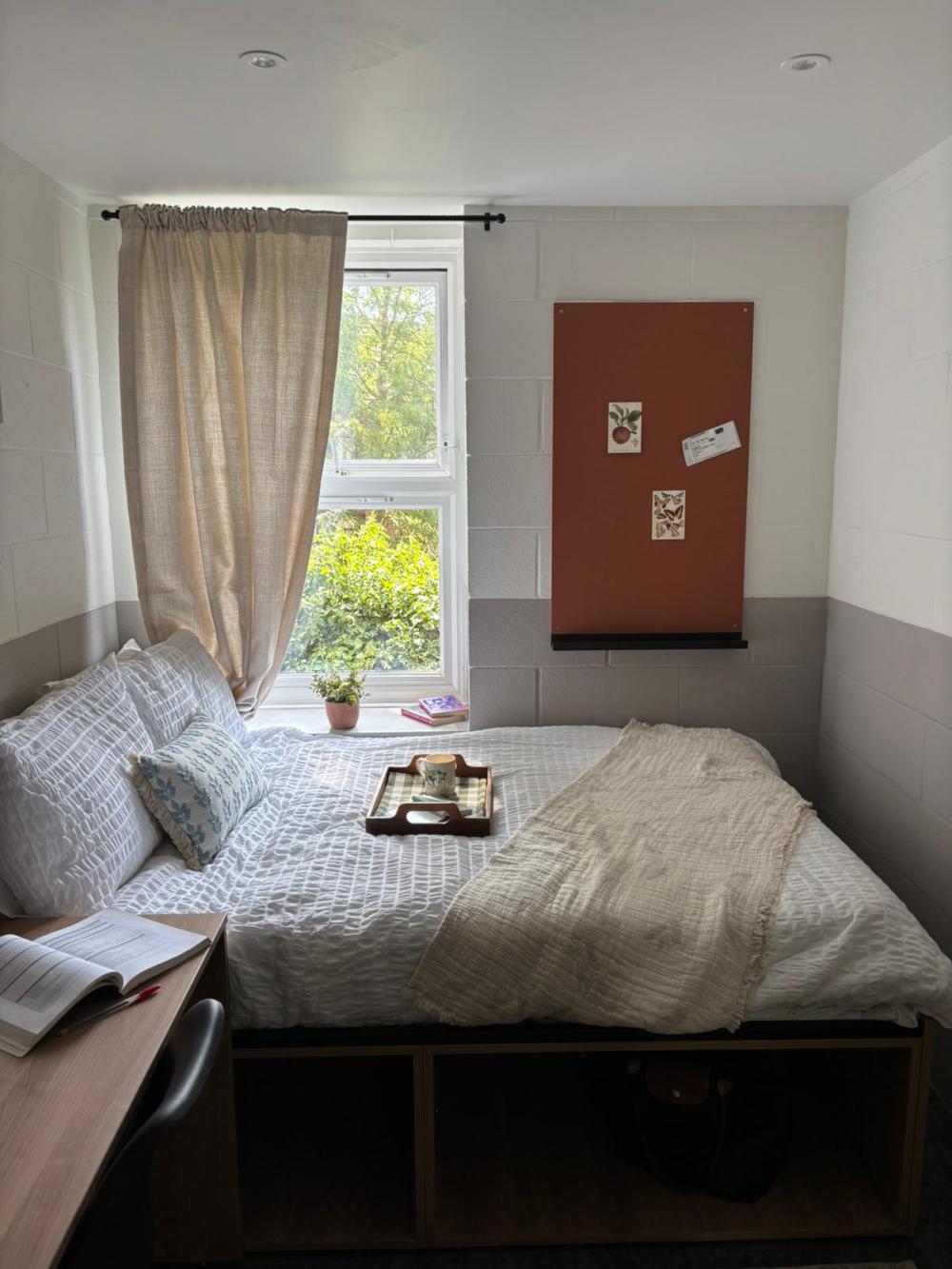Wood Green accommodation bedroom with desk, double bed and pinboard.