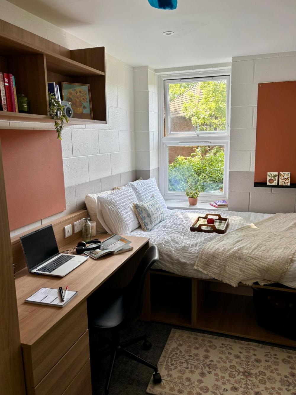 Wood Green accommodation bedroom with desk, double bed and pinboard.